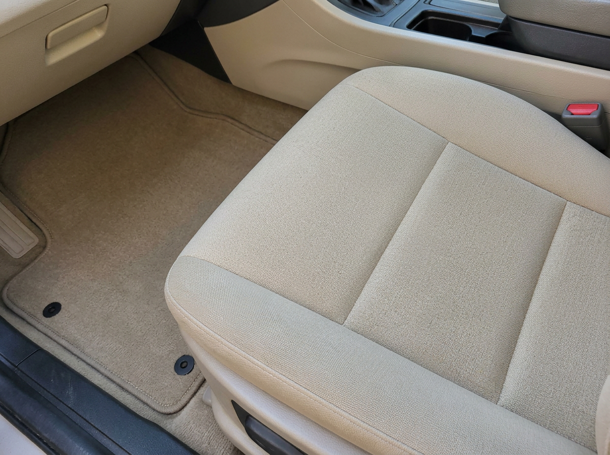 Car seat and floor after cleaning with the HAXSY AirVac